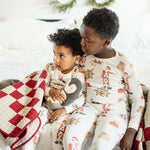 Load image into Gallery viewer, Product Image 1 of Santa&#39;s Little Helper Christmas Celebration Pajamas
