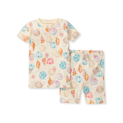 Baby outfit with shell pattern on a white background