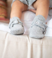Newborn wearing Quilted Bee Organic Baby Booties